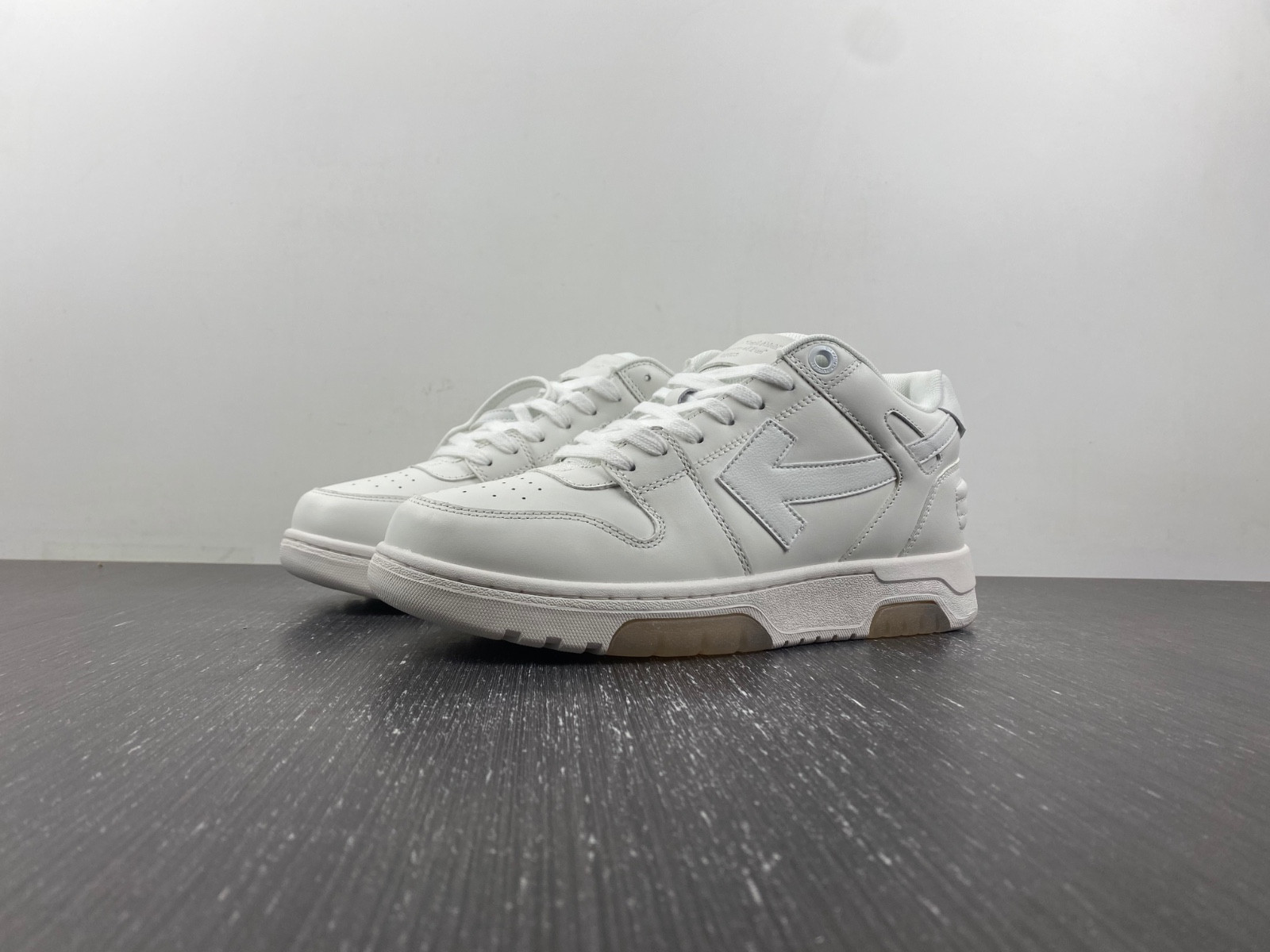 OF™ C/O VIRGIL ABLOH OUT OF OFFICE LOW-TOP LEATHER SNEAKERS ‘OOO“