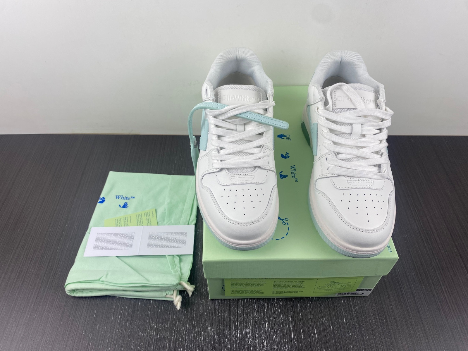 OF™ C/O VIRGIL ABLOH OUT OF OFFICE LOW-TOP LEATHER SNEAKERS ‘OOO“