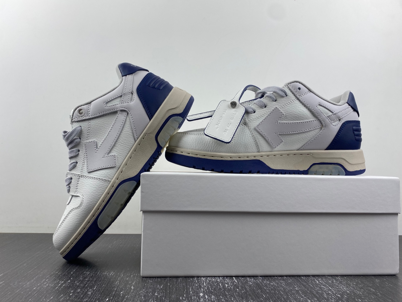 OF™ C/O VIRGIL ABLOH OUT OF OFFICE LOW-TOP LEATHER SNEAKERS ‘OOO“