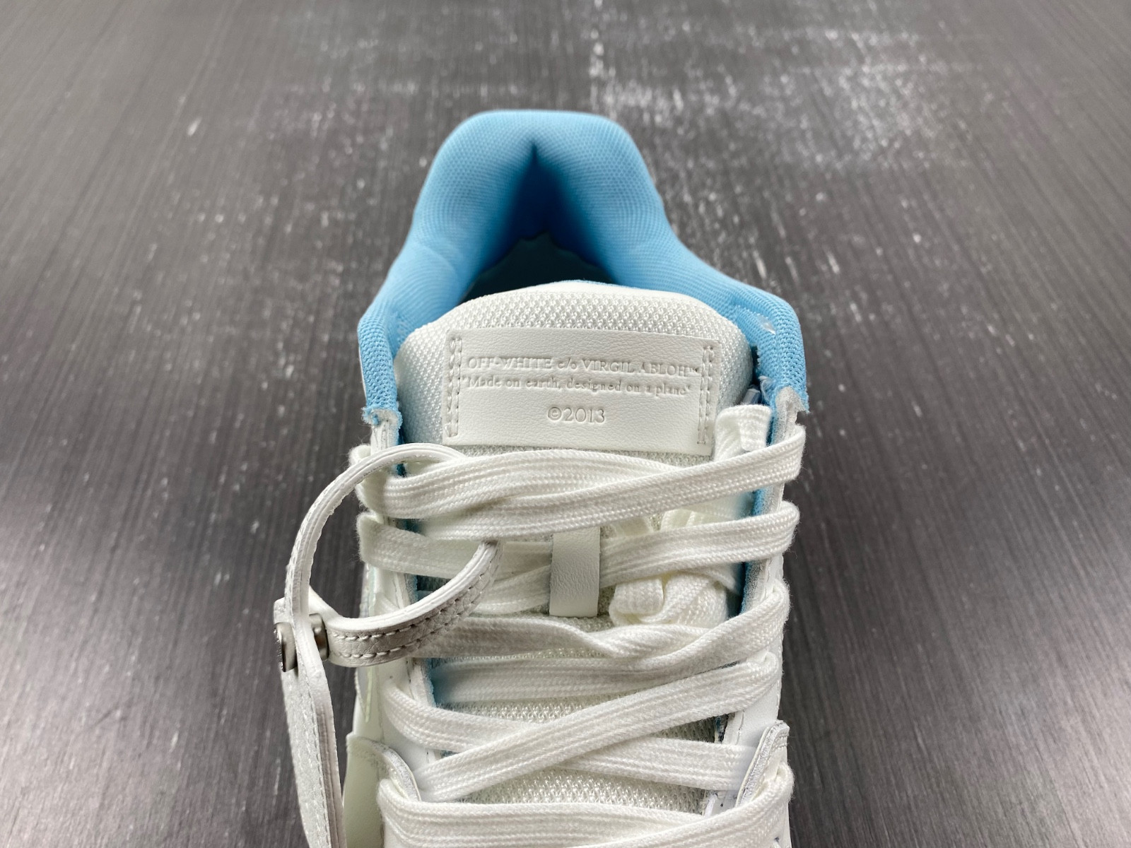 OF™ C/O VIRGIL ABLOH OUT OF OFFICE LOW-TOP LEATHER SNEAKERS ‘OOO“