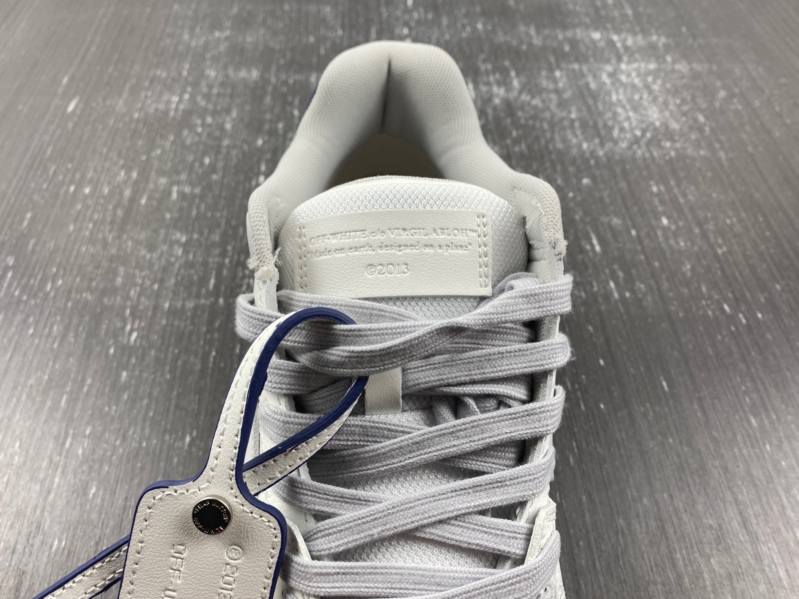 OF™ C/O VIRGIL ABLOH OUT OF OFFICE LOW-TOP LEATHER SNEAKERS ‘OOO“
