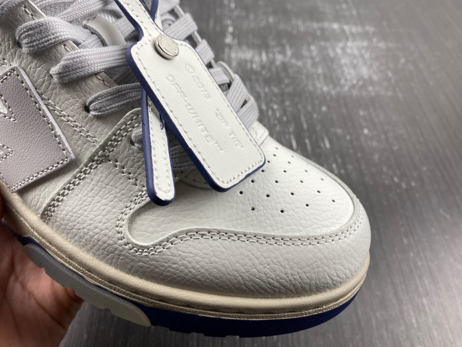 OF™ C/O VIRGIL ABLOH OUT OF OFFICE LOW-TOP LEATHER SNEAKERS ‘OOO“