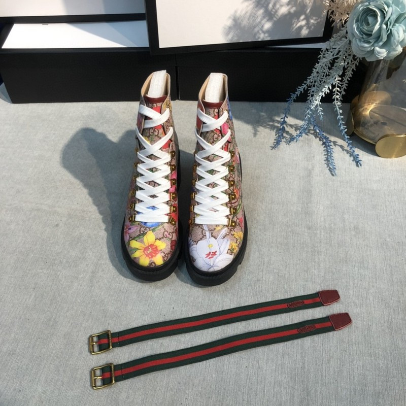 G*u*i boots