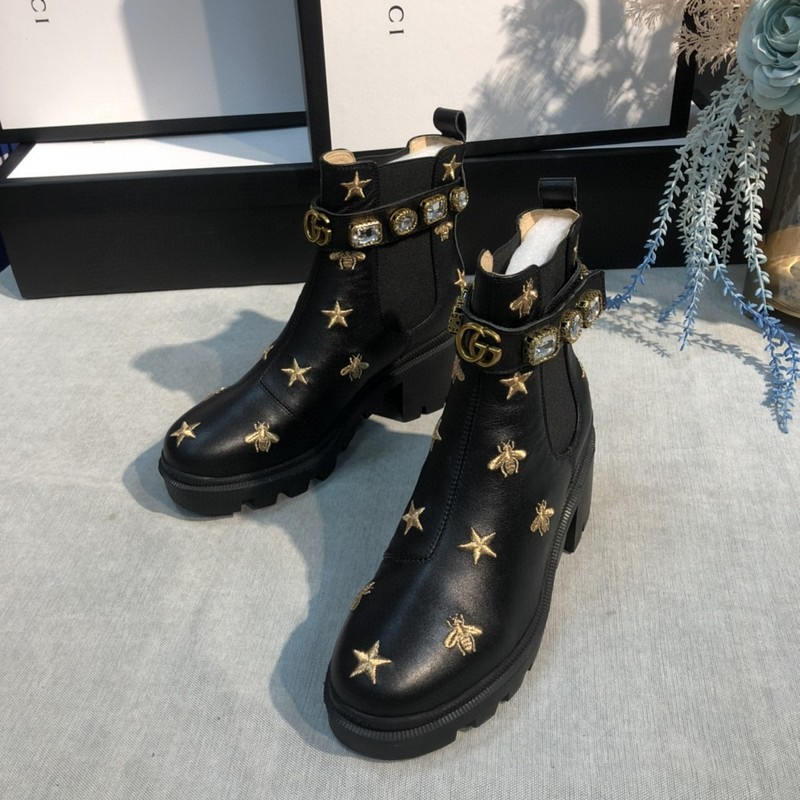 G*u*i boots