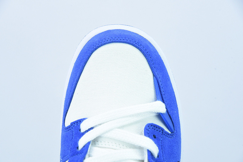 NIKE DUNK LOW DISRUPT 2 WHITE UNIVERSITY BLUE DH4402-102