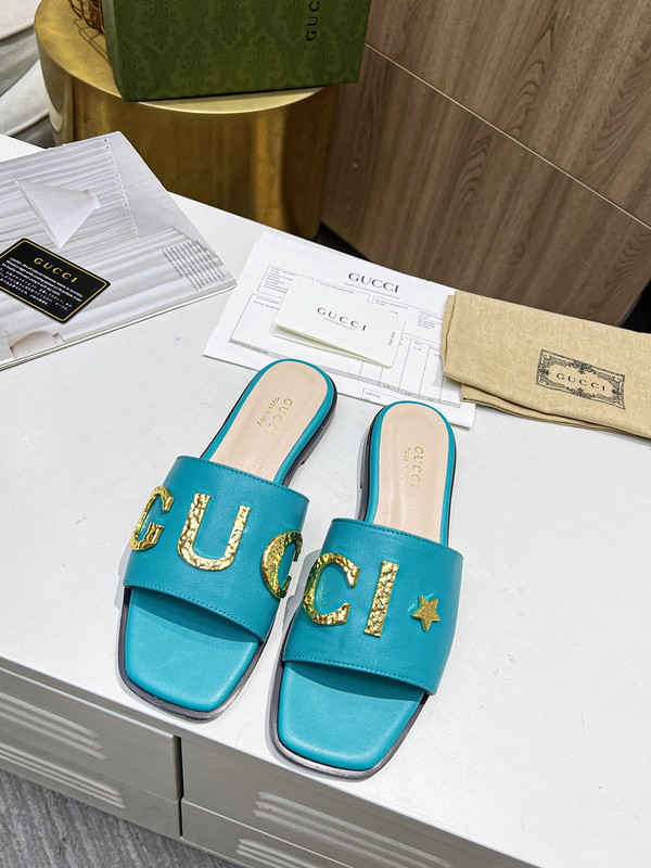 G*u*i sandals
